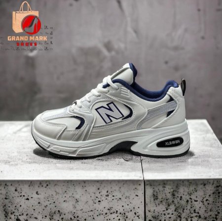 ابيض مع كحلي